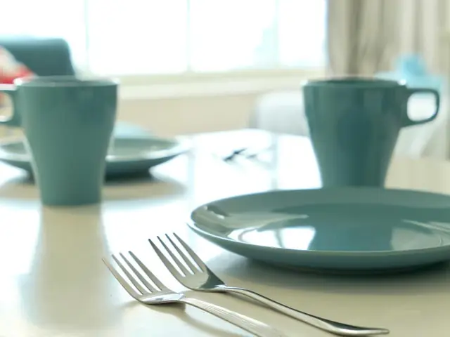 Mugs and plates for coffee and tea in a studio at KLCC Parkview 1
