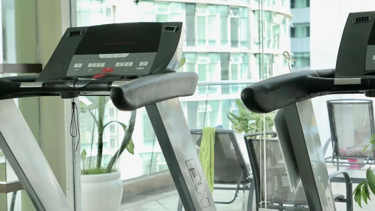Gym at KLCC Parkview 1, with treadmills facing the window