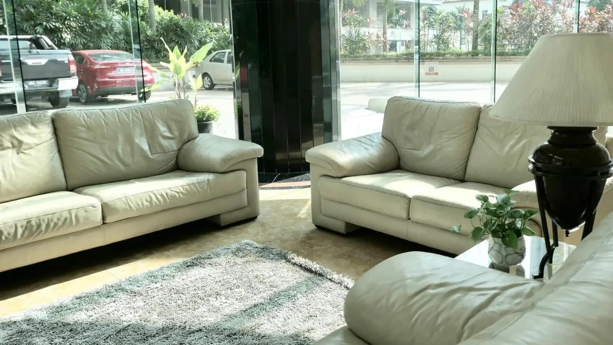 Entrance lounge at KLCC Parkview 1, with leather sofas and plants